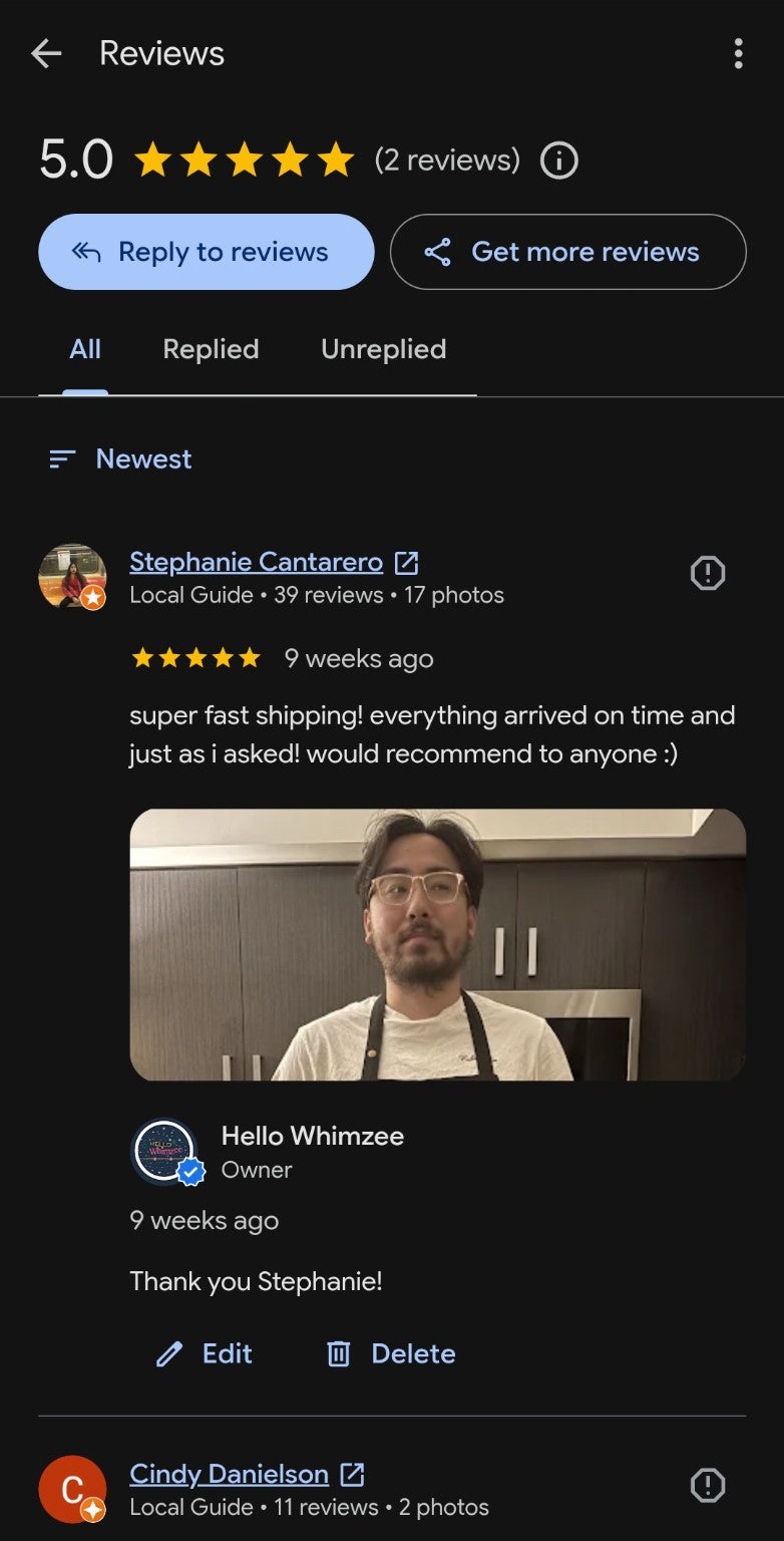 Customer wearing an apron after receiving a Hello Whimzee order